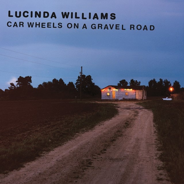 Car Wheels On a Gravel Road - 2